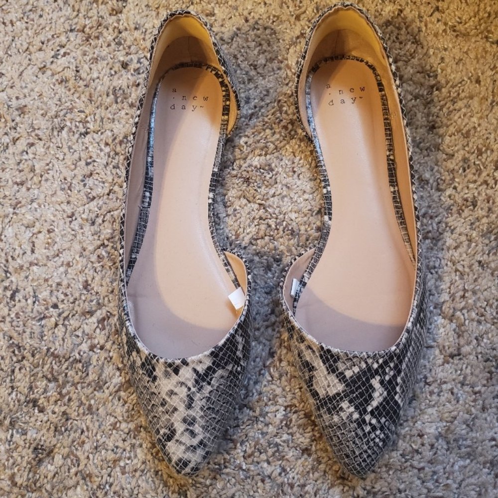 Cream & black flat with snakeskin print.